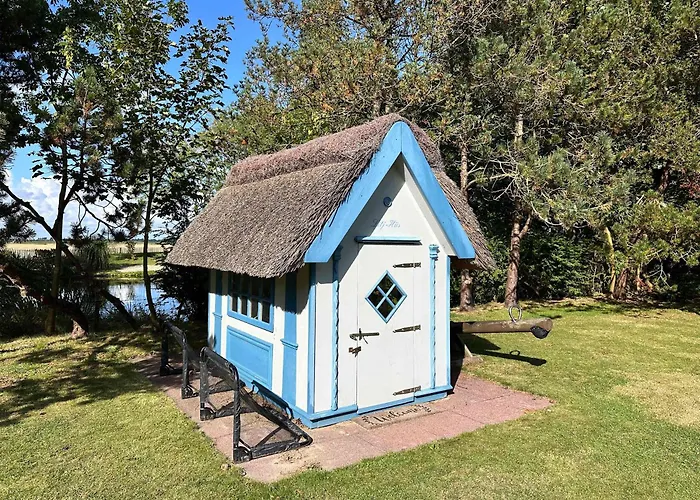 Apartamento Sky & Homes Strandlaeufer I Stilvolle Unter Reet In Spo Mit Parkgarten